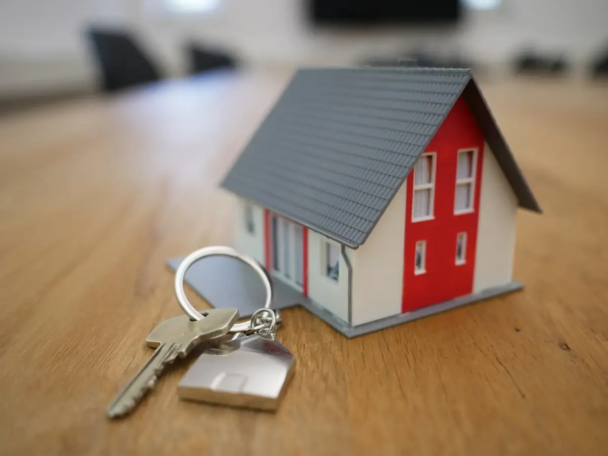 A picture of house with the key